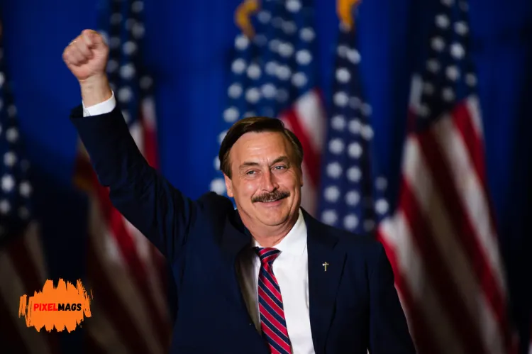 Mike Lindell stand hand with americen flag background