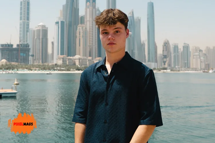 Jack is standing in front of a waterfront.