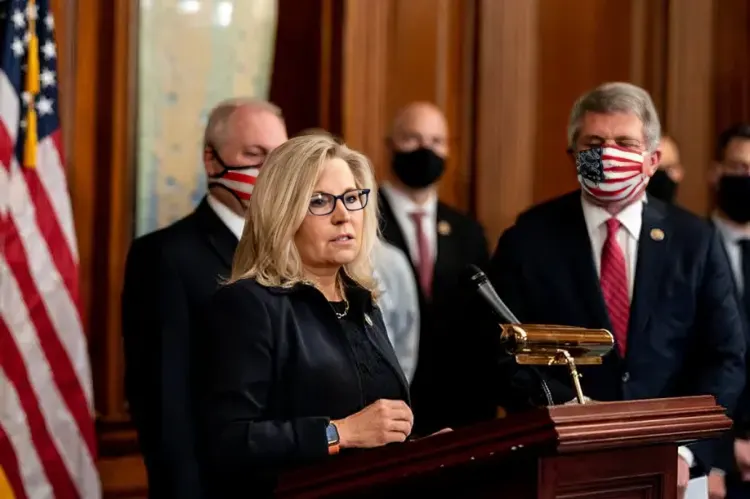 A mid-shot portrait of Liz Cheney in a business suit.