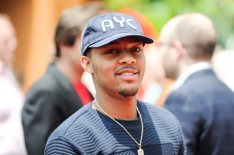 Create a dramatic, high-impact thumbnail image featuring Bow Wow (Shad Moss)