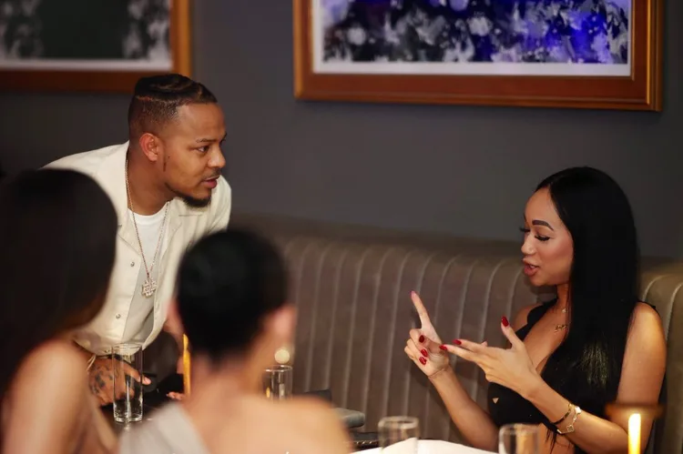 Create a stylish business-focused image of Bow Wow in a modern luxury setting, showcasing his durag brand collaboration