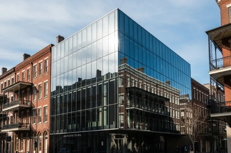 Modern glass exterior of Jepson Center with historic Savannah