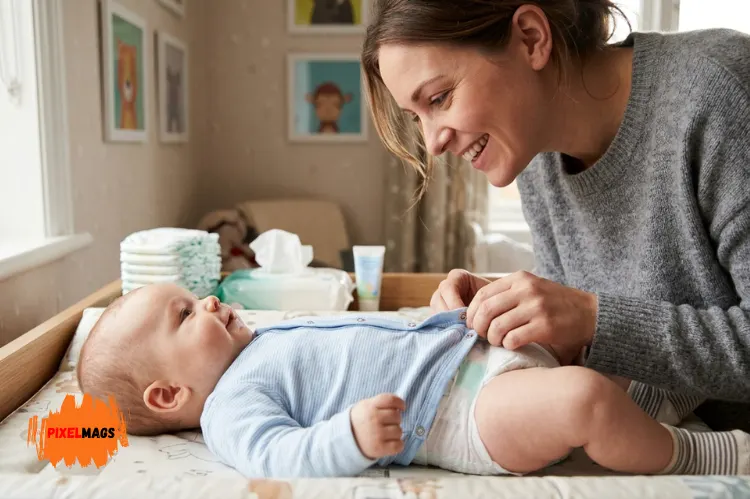 Mother changing baby diaper, snap-button onesie close-up, practical baby care moment.