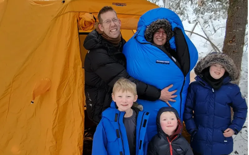 A picture of luke with her wife and 3 kids
